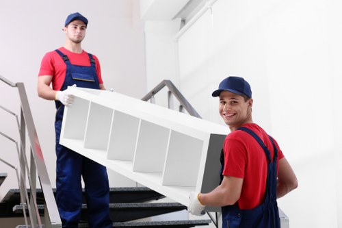 Careful packing and furniture handling during an Acton house move