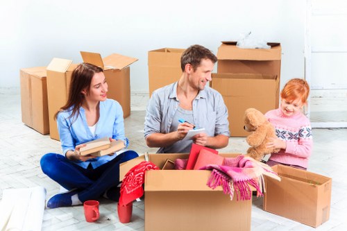 Local office relocation planning in Acton with business equipment and moving crates