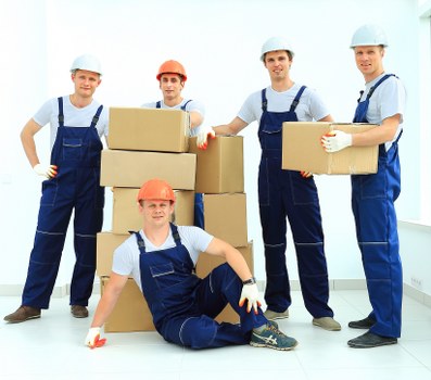 Local team collecting bulky furniture from an Acton property