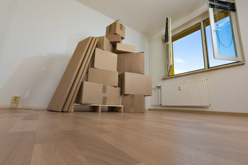 A van service handling a flat move in Acton with careful packing