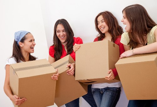 Local West London moving team handling boxed household items