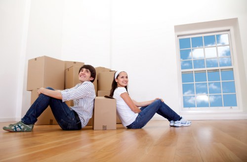 Local movers handling a careful piano transport job in West London