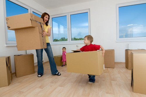 Office furniture being loaded for a commercial relocation in Acton