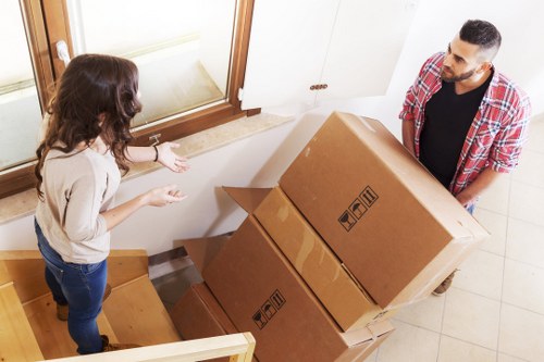 Packed office furniture and IT equipment ready for transport