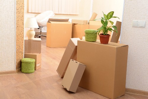 Moving supplies and labelled boxes prepared for a flat move in Acton