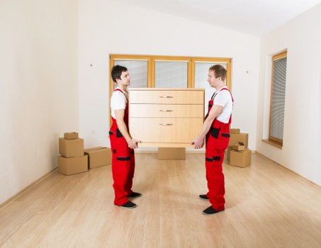 Commercial office move logistics in Acton with labelled boxes and desks
